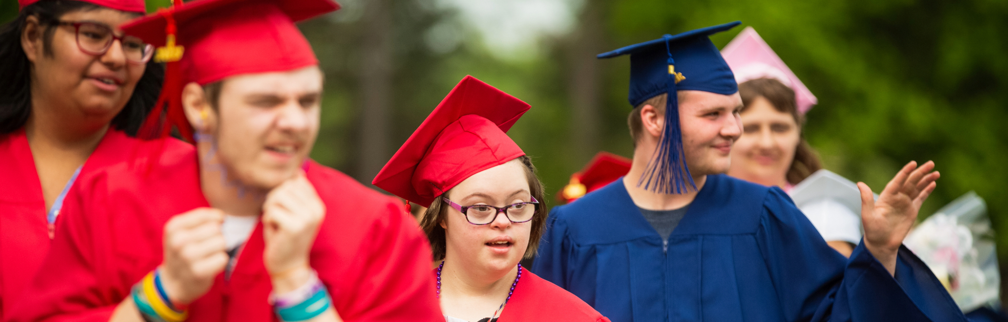 Students wearing graduation gowns